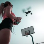 Fellow drivers and regional drivers girl fly drone